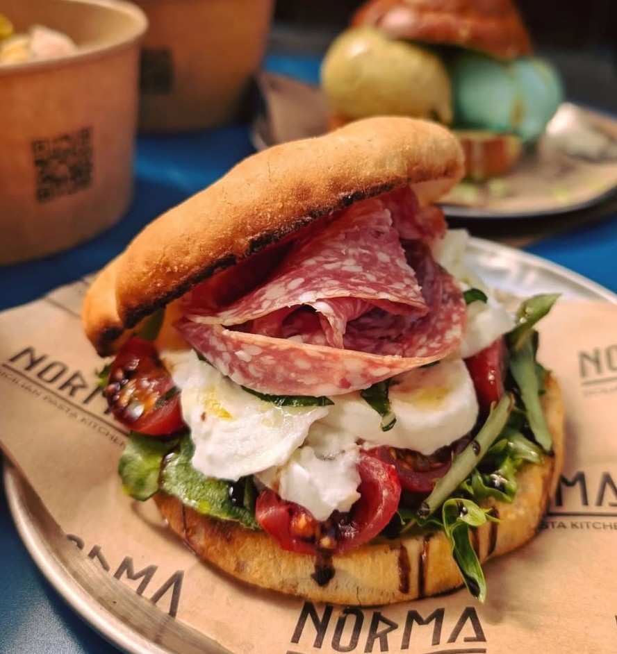 Norma sandwich with salami, mozzarella and salad